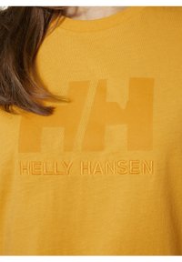 Helly Hansen HH LOGO - Camiseta estampada - honeycomb