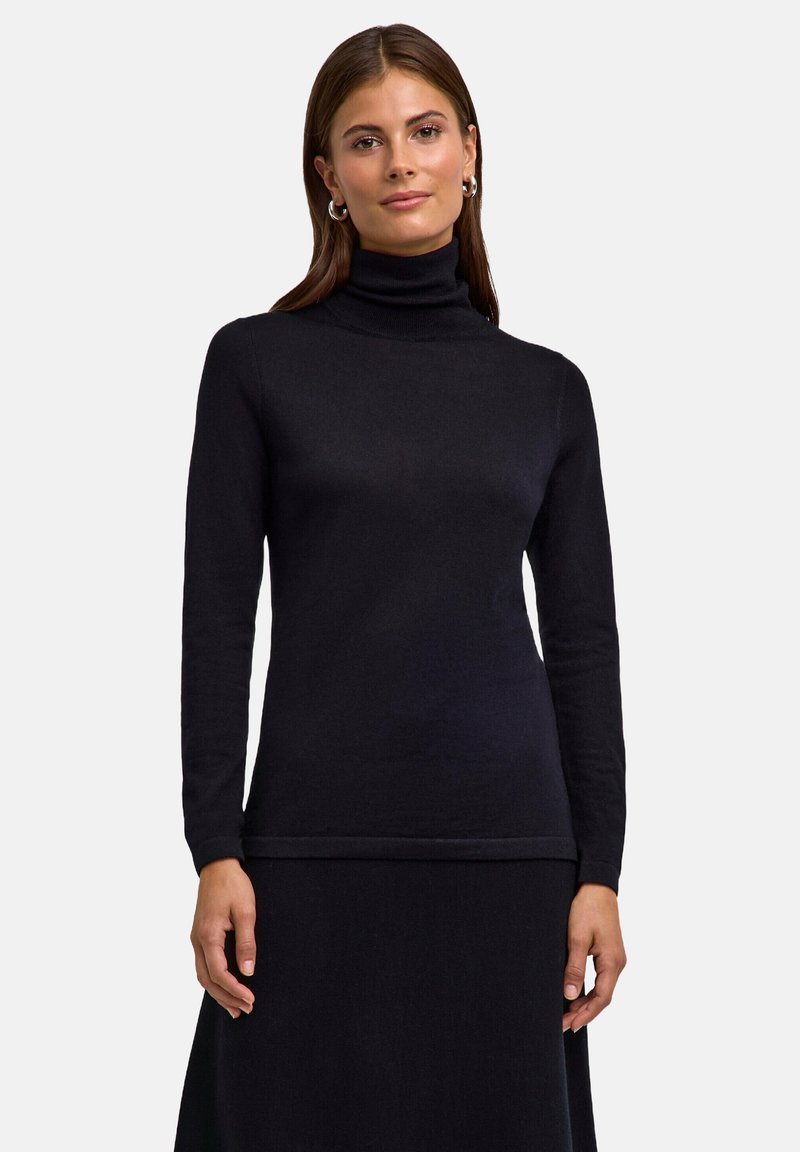 Schwarzer Rollkragenpullover aus weichem Stoff, der lange Ärmel und ein tailliertes Design für eine schlanke Silhouette aufweist.