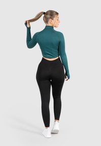 Smilodox SERINA - Chaqueta de entrenamiento - dunkelgrün