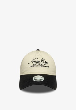 Beige and black baseball cap with "New Era Authentic American Sportswear" embroidered on front and a sticker on the black visor.