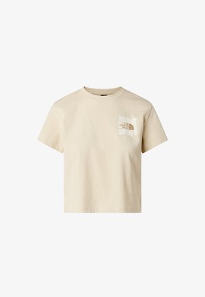 Korte mouw T-shirt in lichtbeige katoen. Voorzien van een gedrukt logo in donkerbruin op de linkerborst. Klassiek ronde halsontwerp.