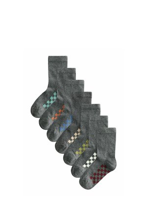 Set di sette calzini grigi con accenti a motivi in turchese, arancione, blu, beige, verde, bianco e rosso, caratterizzati da una morbida texture lavorata a maglia.