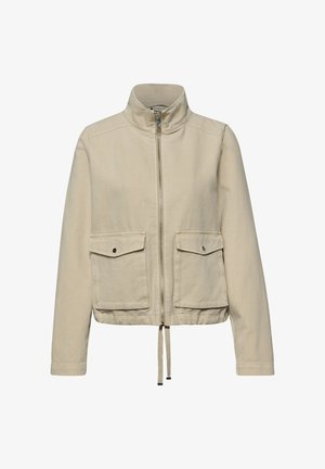 Beigen värinen vetoketjullinen takki, jossa on kaksi etutaskua läpällä, korkea kaulus, pitkät hihat ja säädettävä nauhamallinen helma.