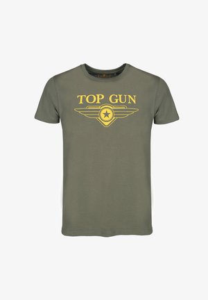 Oliivinvihreä puuvillainen T-paita, jossa on keltainen "TOP GUN" -grafiikka siivillä ja tähtimerkki edessä.