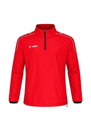 Pullover sportivo rosso a maniche lunghe con zip a quattro quarti, cerniera nera, piping bianco sulle spalle e logo JAKO sul petto e sulle spalle.