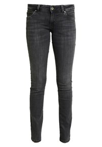 Svart slim fit jeans i denim, med en mjuk yta, framfickor och dragkedjestängning med en grön knappdekor.