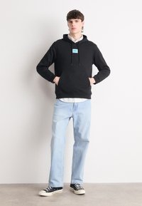 HUGO DARATSCHI - Hoodie - black