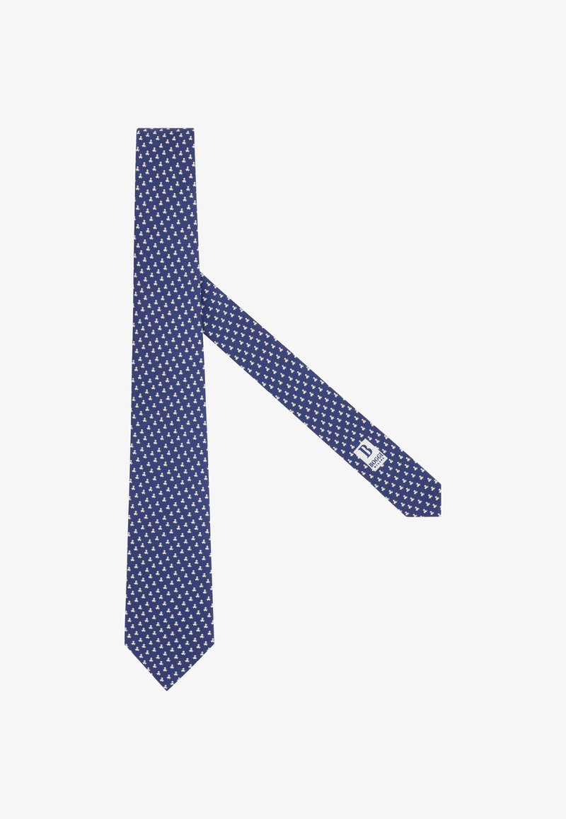 Cravate bleue avec de petits motifs floraux blancs et une étiquette de marque visible au dos sur fond blanc.