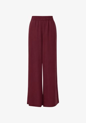 Pantaloni larghi bordeaux con cintura elastica. Tessuto morbido, colore uniforme e taglio a tutta lunghezza, adatti per un look casual o rilassato.