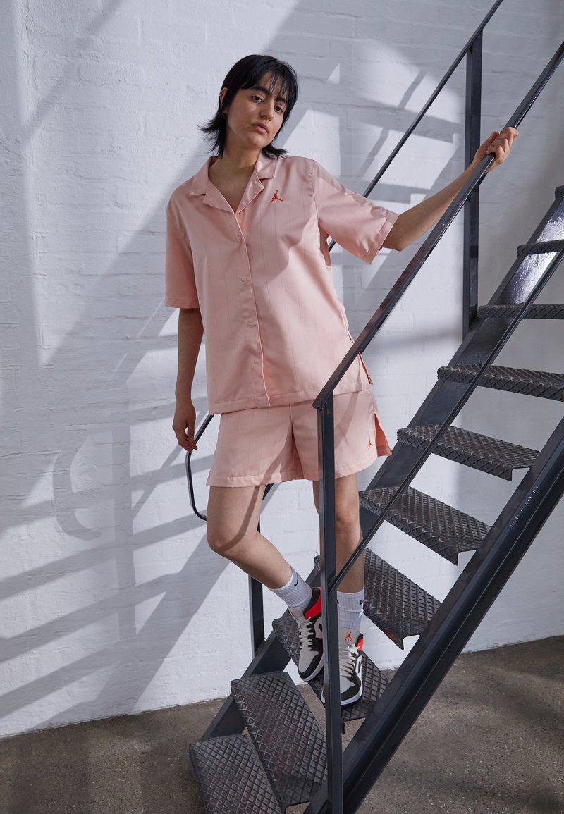 Jordan HERITAGE Tracksuit bottoms arctic orange/pink Zalando.de