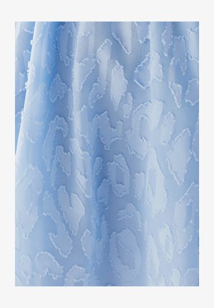 Light blue fabric with a textured, raised leopard pattern. The material appears soft and sheer with frayed edges on the design elements.