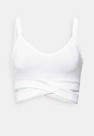 Hvid kort camisole med tynde skulderstropper og bredt krydsbånd-detalje foran nederst.