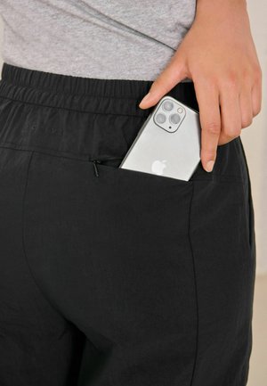 WALKING - Cargo trousers - black