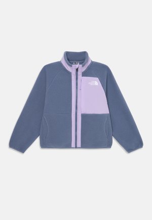 Sinine ja lavendlivärvi fliisjakks täispika lukuga, kahe eesmise taskuga, seisva kraega ning The North Face logo rinnataskus.