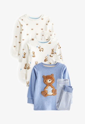Set aus drei Kinderlangarmshirts: zwei in Creme mit Bärenmotiven, eines in Blau mit einer Bärenapplikation. Passende gestreifte Hosen in Blau.