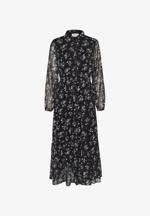 Mustaline lillemustriga kleit, millel on pikad läbipaistvad varrukad, nööpidega ees, rõhutatud vöökoht ja kihiline seelik. Omab kogu kleidi ulatuses valgeid lillemustreid.