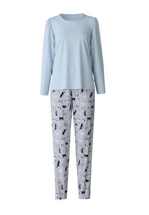 Helles blaues Langarmoberteil mit Puffärmeln, kombiniert mit gemusterten Hosen, die verschiedene Katzen auf einem sanften blauen Hintergrund zeigen.