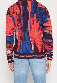 Carlo Colucci Sweter