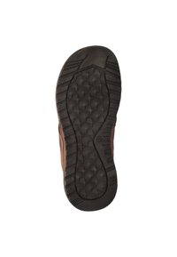 Bruine leren schoenzool met een gestructureerde zwarte rubberen loopvlak voorzien van hexagonale patronen en groeven voor grip. De omtrek is taps toelopend.