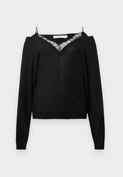 Haut noir à manches longues avec un design épaules dénudées, une incrustation en mesh transparent en forme de V et des poignets côtelés. Matière douce avec une finition légèrement texturée.