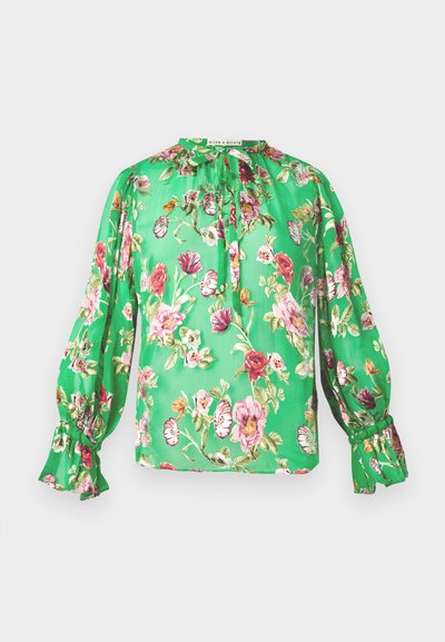 Floral blouse in vibrant green fabric with puffed sleeves, ruffle accents, and a gathered neckline. Features multicolored floral print.