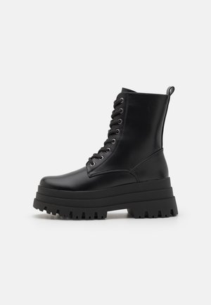Platform ankle boots - black