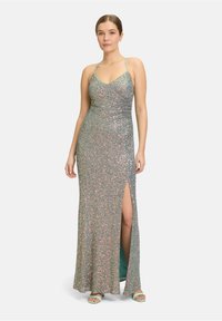 Glitzerndes tealfarbenes Abendkleid mit verstellbaren Spaghettiträgern, seitlichem Schlitz und taillierter Silhouette. Strukturierte Oberfläche mit funkelnden Pailletten.