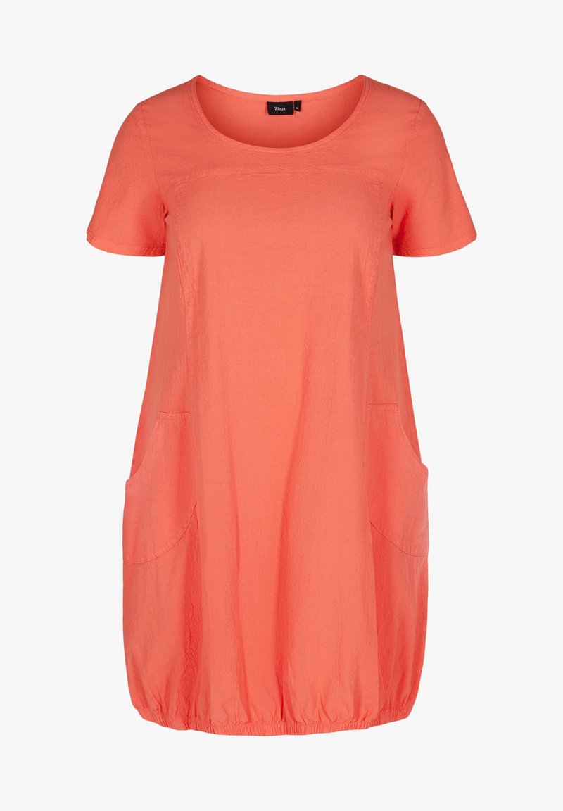 Robe ample corail à manches courtes avec encolure ronde, deux grandes poches latérales et ourlet élastique.