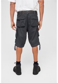 Dark gray cargo shorts with side pockets, tie accents, and a belt. Made from durable fabric, featuring a relaxed fit and knee-length design.