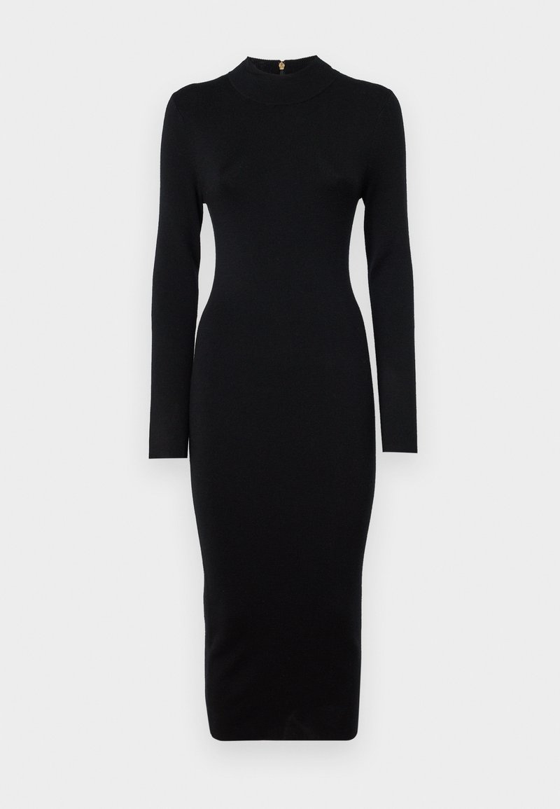 Abito nero aderente con maniche lunghe, scollo alto, texture a coste e silouette di lunghezza media. Dotato di zip sul retro con finiture dorate.