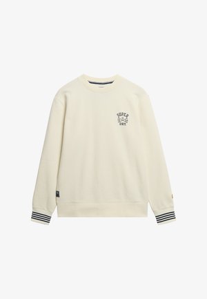 Crème-kleurige sweatshirt van zacht stof, met een marineblauw logo en gestreepte manchetten. Klassieke ronde hals en een ontspannen pasvorm.