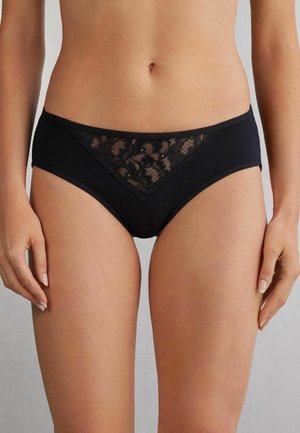 Zwarte katoenen bikini ondergoed met een kantaccent aan de voorkant, driehoekige vorm en zachte elastische tailleband voor comfort.