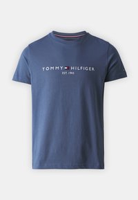 Navy blue cotton t-shirt featuring crew neck, short sleeves, and front logo with "TOMMY HILFIGER EST. 1985" in white and red text.
