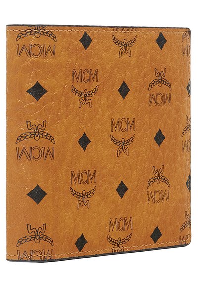 Portefeuille en cuir tan présentant un motif en relief du logo MCM, des formes de diamant et une finition texturée. Les bords surpiqués renforcent la durabilité.