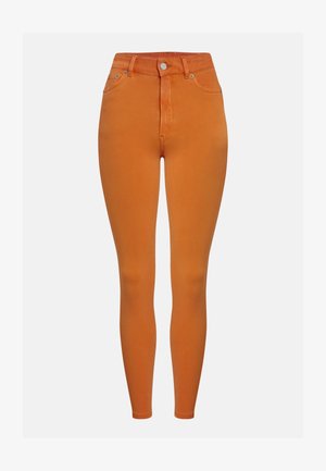 Orange high-waisted skinny jeans made from smooth cotton blend, featuring a button closure and standard five-pocket design.