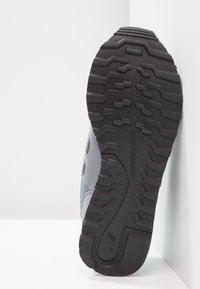 New Balance GW500 - Joggesko - grey/gold