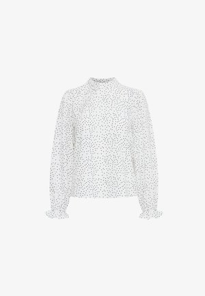 Bela bluzica s črnimi pikami, visokim ovratnikom, dolgimi rokavi z nabranimi manšetami in subtilno detajliranjem gumbov na strani. Lahka tkanina.
