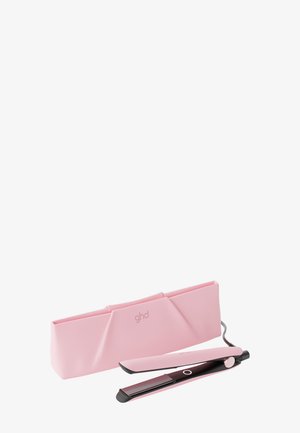 Pink glattejern med sorte plader ved siden af et matchende blødt beskyttelsesetui på hvid baggrund.