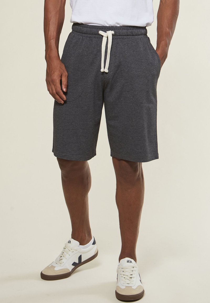 Gray cotton blend bermuda shorts with an elastic waistband and white drawstring, featuring side pockets and a relaxed fit.