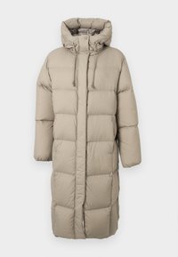 Long, beige puffer coat with a hood, featuring a quilted design, adjustable drawstrings, and a front zip closure. Smooth texture, knee-length.