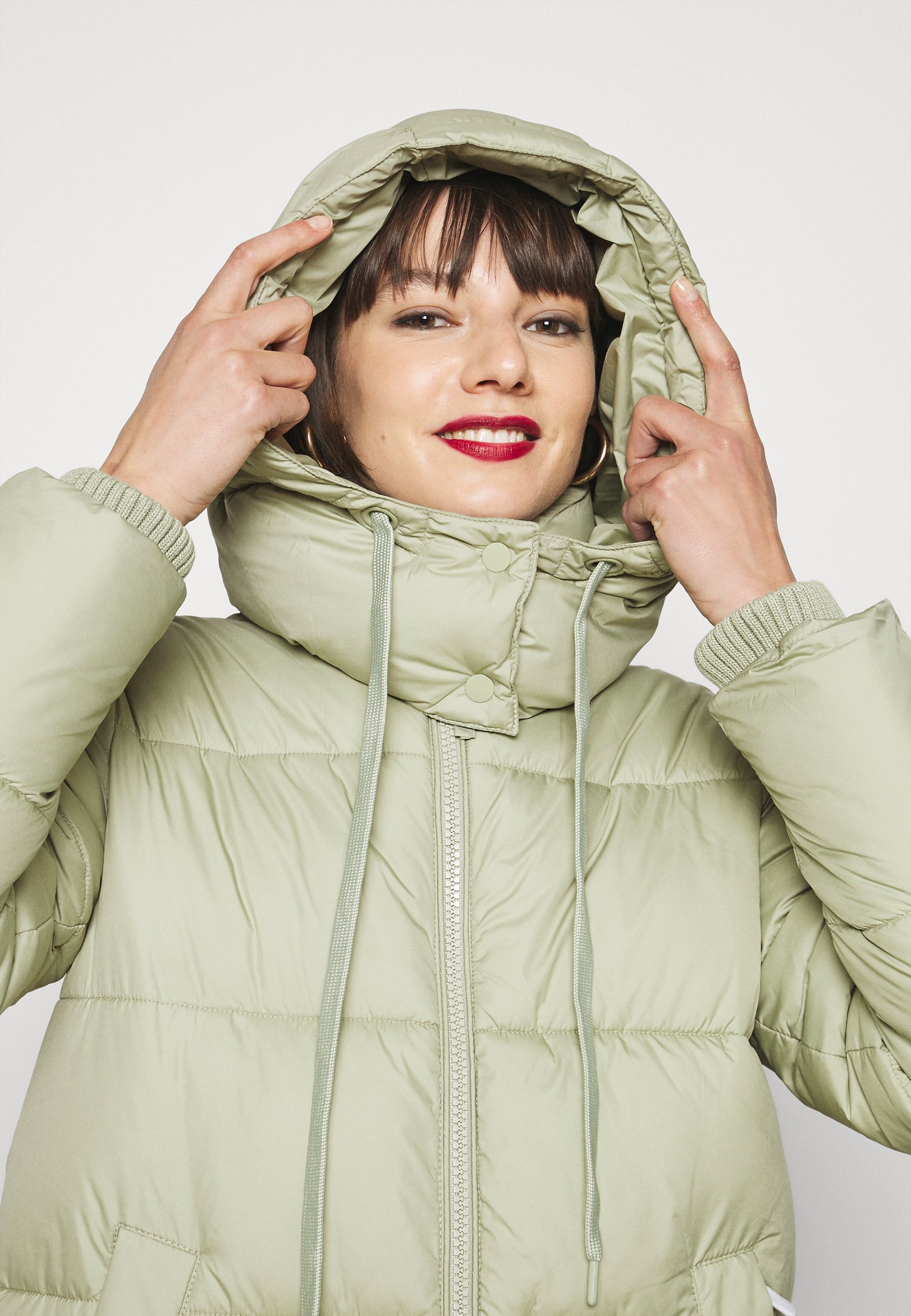 mint green winter coat