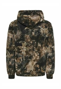 Veste en polaire à capuche avec un motif de camouflage en feuilles marron, noir et beige, manches élastiques et coupe décontractée vue de dos.