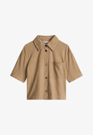 Tan short-sleeve shirt with large collar, front buttons, and single chest pocket, displayed on a white background.