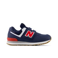 Marineblaue Sportschuhe mit weißen Akzenten, rotem "N"-Logo, Klettverschluss, gepolstertem Schaft und gummierter Sohle mit Rillen für bessere Traktion.