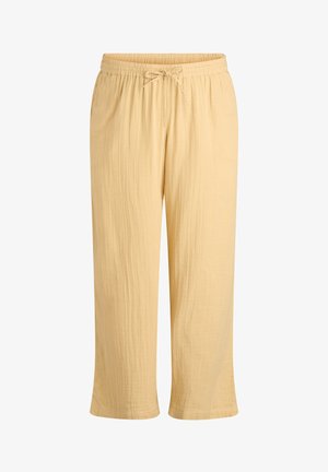 Pantalones beige de corte holgado con cintura elástica y cordón, tejido ligero y texturizado, piernas rectas recortadas.