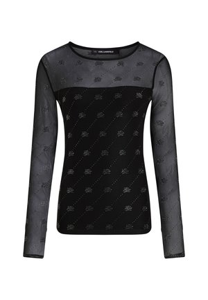 Svart langermet topp med en gjennomsiktig mesh-overdel, med et teksturert mønster og subtile glitrende detaljer. Rund hals, tettsittende design.