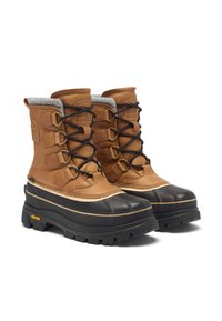 Ruskeat nahkaiset lumisaappaat, joissa on musta kuminen kärki, viisi rei’itystä nyöritykselle ja harmaa vuori. Vibram-pohjassa on kestävä kuviointi parantamassa pitoa.