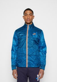 Nike Sportswear Corta-vento - dark blue