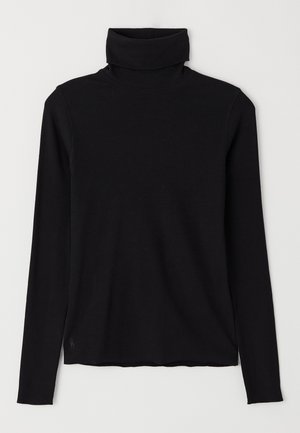 Maglione a maniche lunghe nero con collo alto, realizzato in tessuto a coste. Presenta un colletto alto e una vestibilità rilassata con un orlo leggermente irregolare.