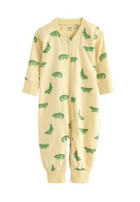 Gul bomullsbody för baby med gröna krokodilmönster, långärmad, dragkedja och elastiska ärmslut. Mjuk textur, lekfull design.